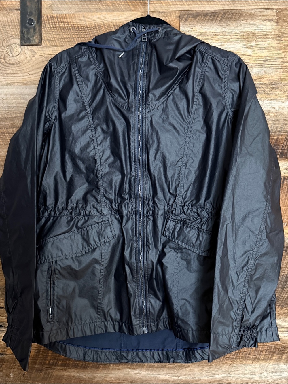 EUC Athleta dark navy rain jacket with hood